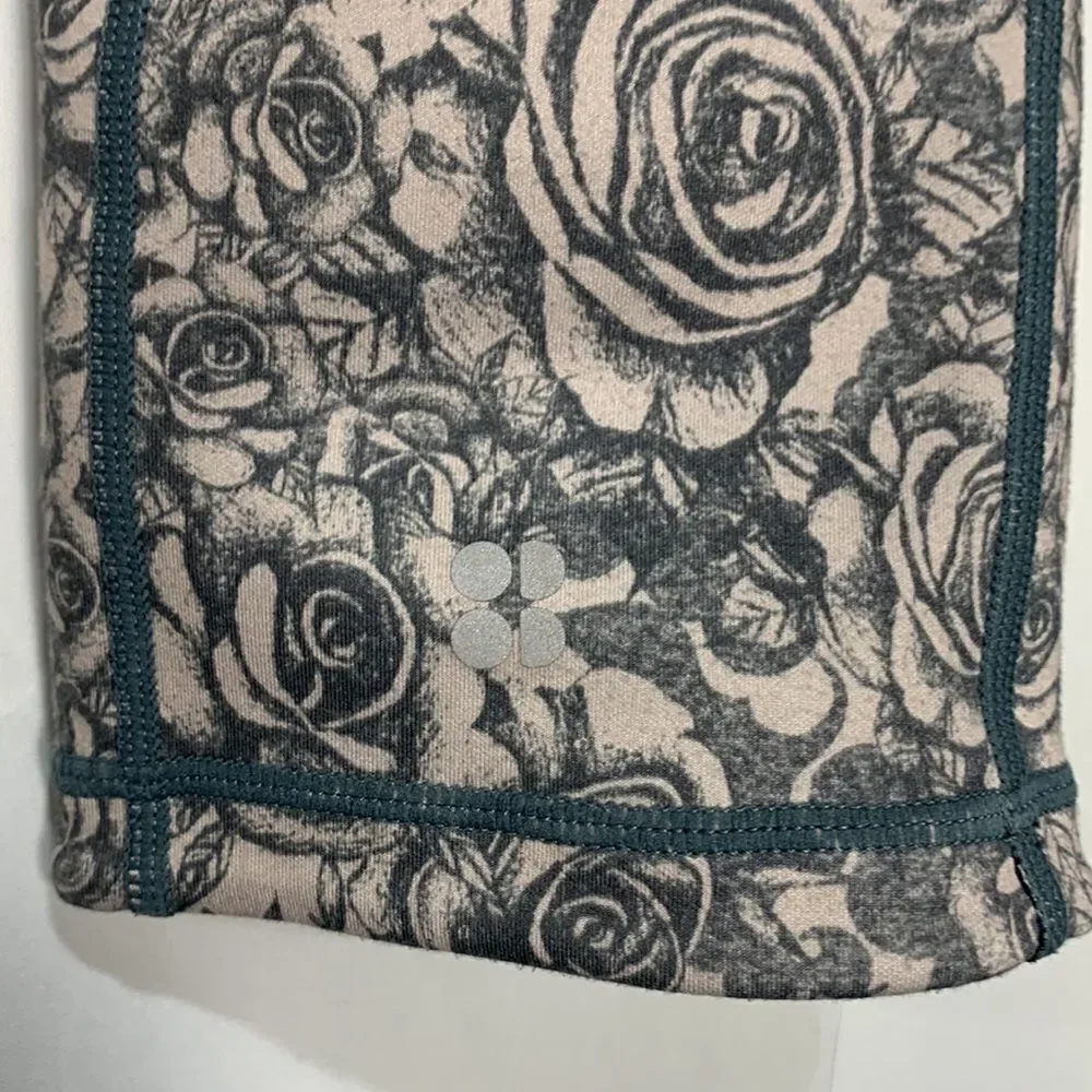 SWEATTY Betty reversible floral/solid black leggings women’s